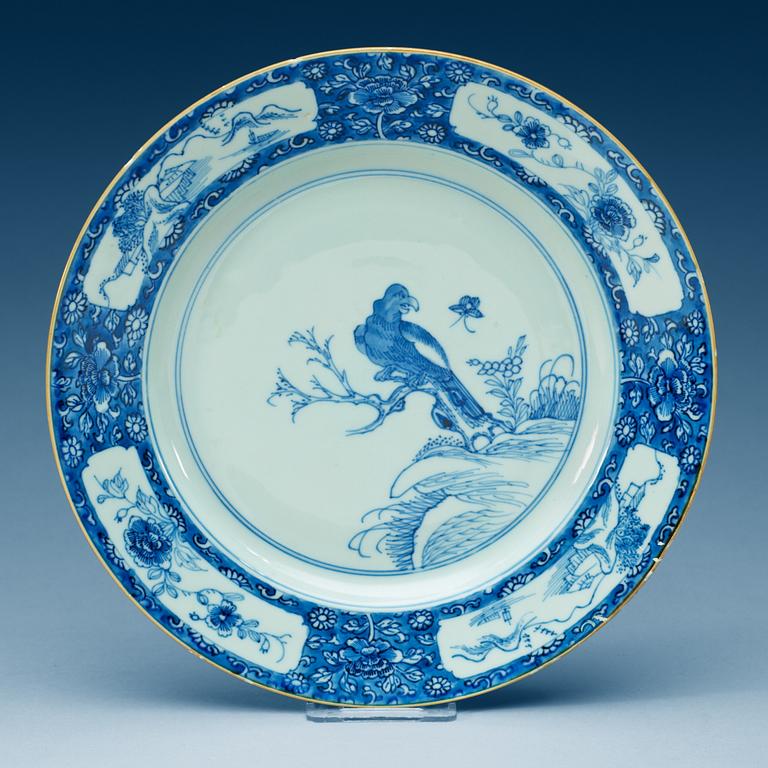 A set of 13 large blue and white plates, Qing dynasty, early 18th Century.