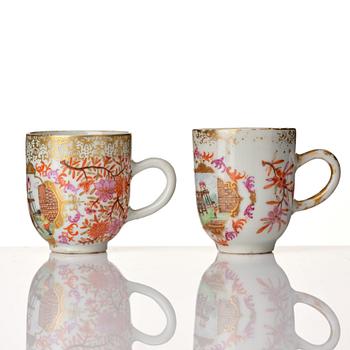A pair of famille rose cups with saucers, Qing dynasty, Qianlong (1736-95).
