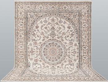 A carpet, Nain, part silk, so-called 9LAA, approx. 395 x 293 cm.