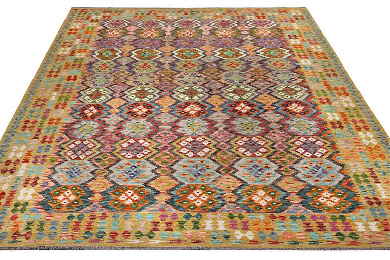 A Kilim carpet, c. 387 x 310 cm.