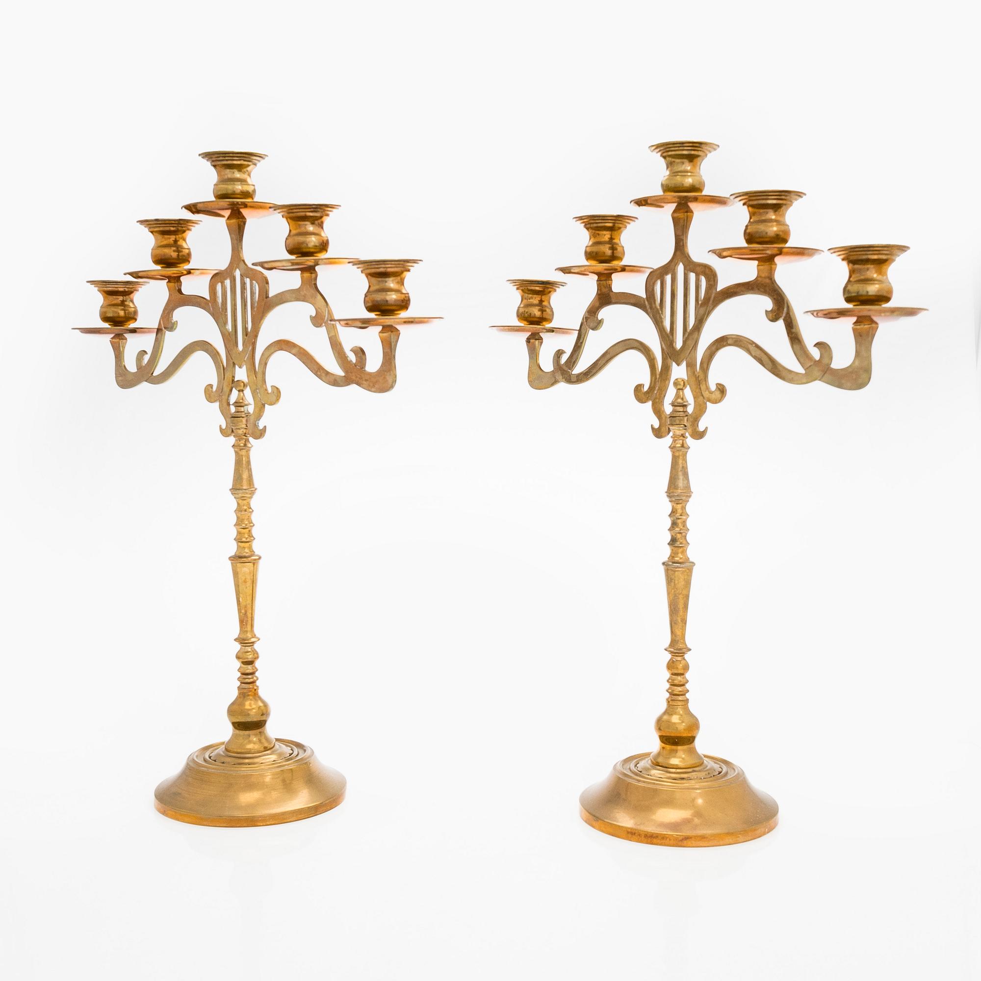 A pair of brass candelabras, early 20th century.