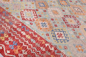 A Kilim carpet, approx. 344 x 268 cm.