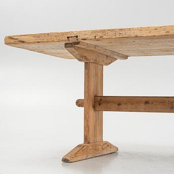 A pinewood trestle table, 18th Century.