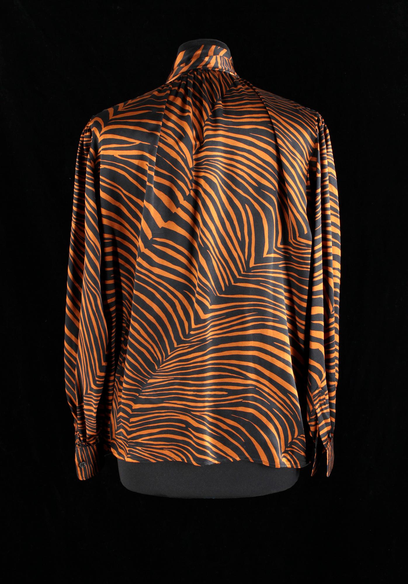 A set of two blouses by Yves Saint Laurent.