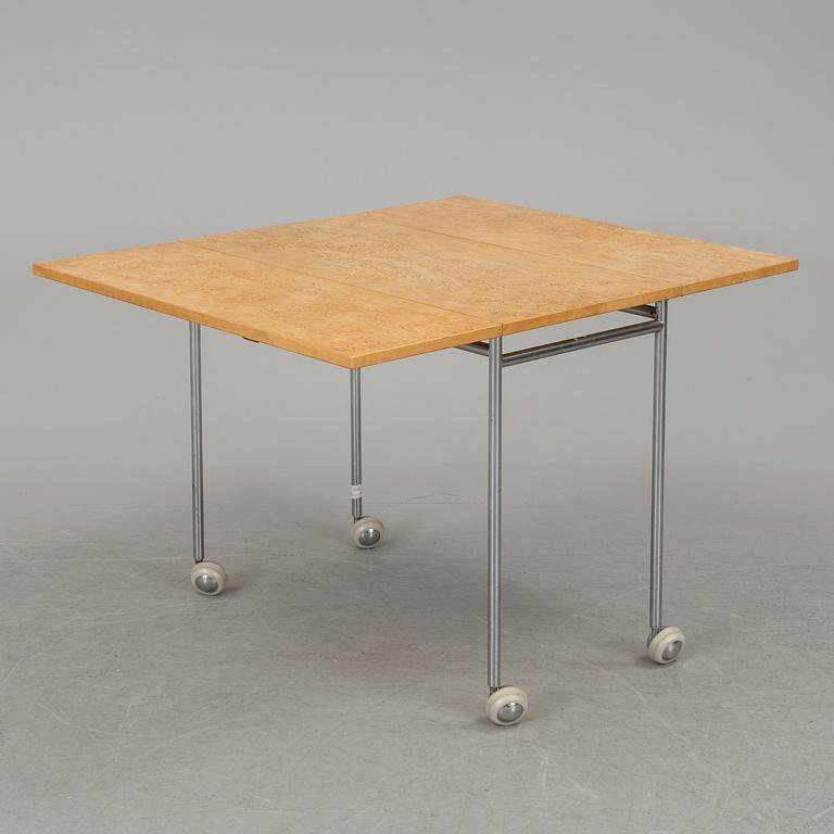 A "Berit" table by Bruno Mathsson.