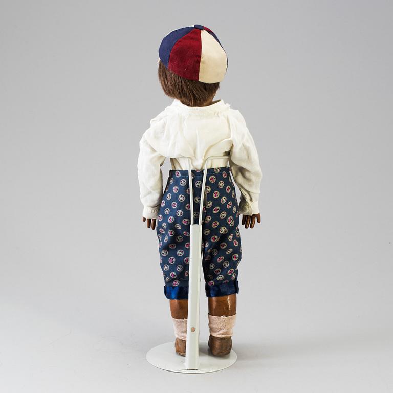 A bisque head doll marked E.D depoussé, France, early 20th century.