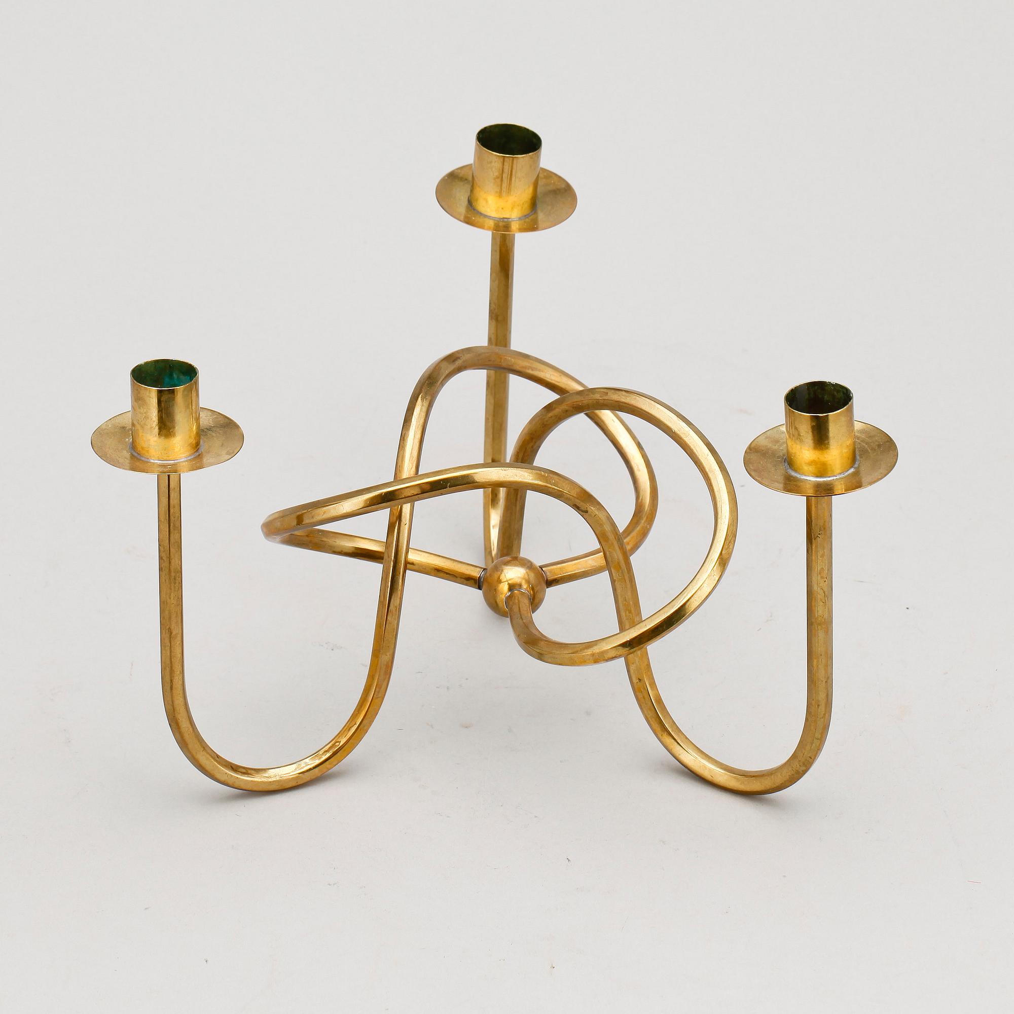 LJUSSTAKE, mässing, "Vänskapsknuten", Josef Frank, Firma Svenskt Tenn, formgiven 1938.