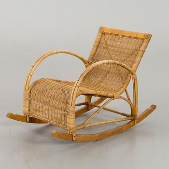 A ROCKING CHAIR, first half of 20th century.