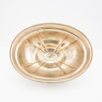 Two frying pan lids and a footed bowl, NPNS, 20th century.