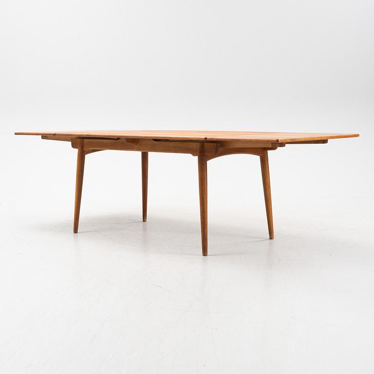 Hans J Wegner, a model 'AT-312' teak veneered dining table, Andreas Tuck, Denmark.