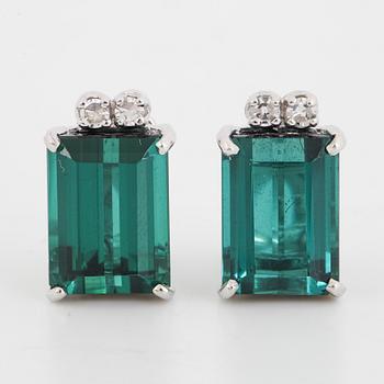 Earrings with green tourmalines and eight-cut diamonds.