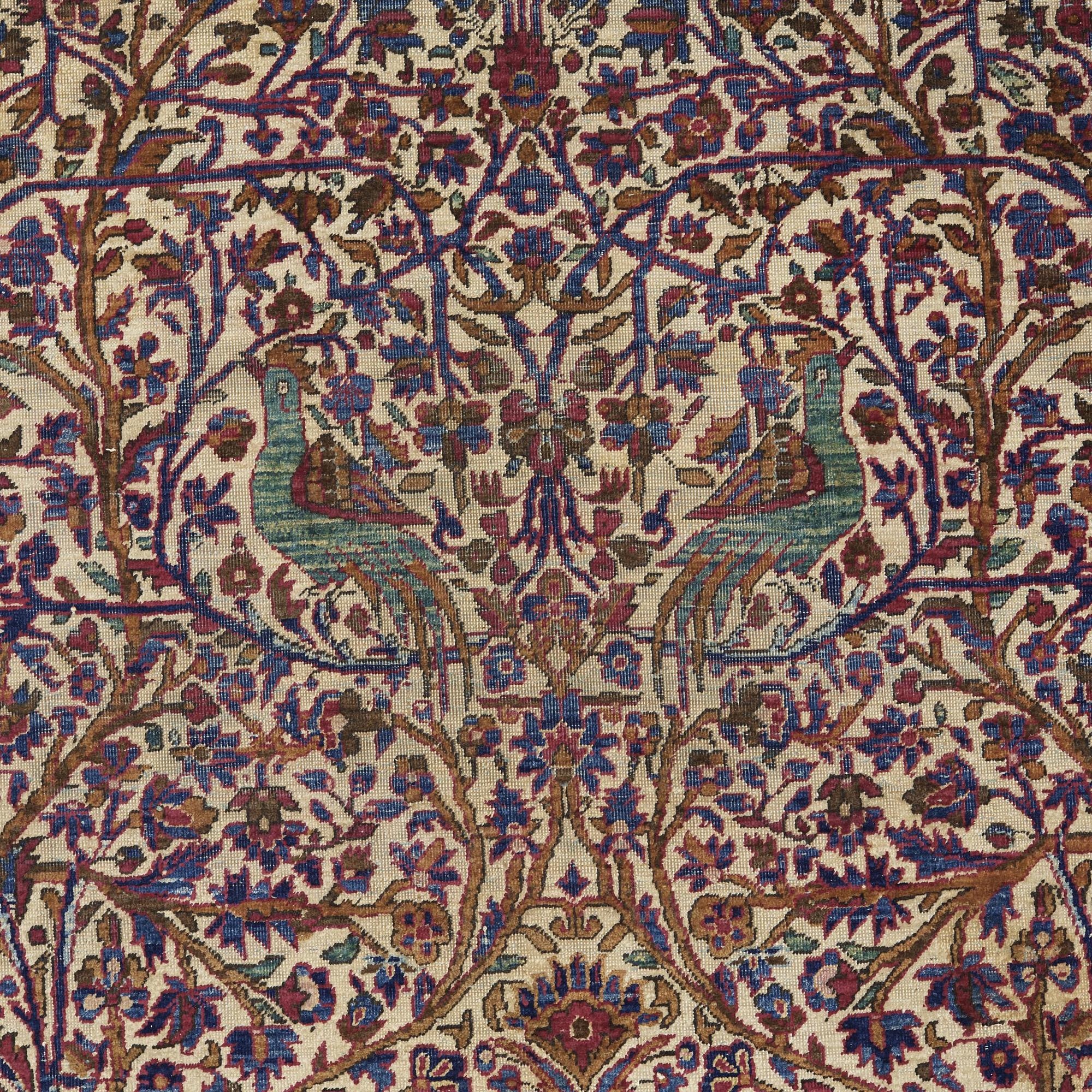A CARPET, a semi-antique silk Kashan, ca 198,5 x 137 cm.