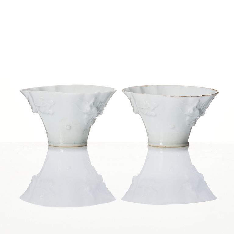A pair of blanc de chine libation cups, Qing dynasty, 19th Century.