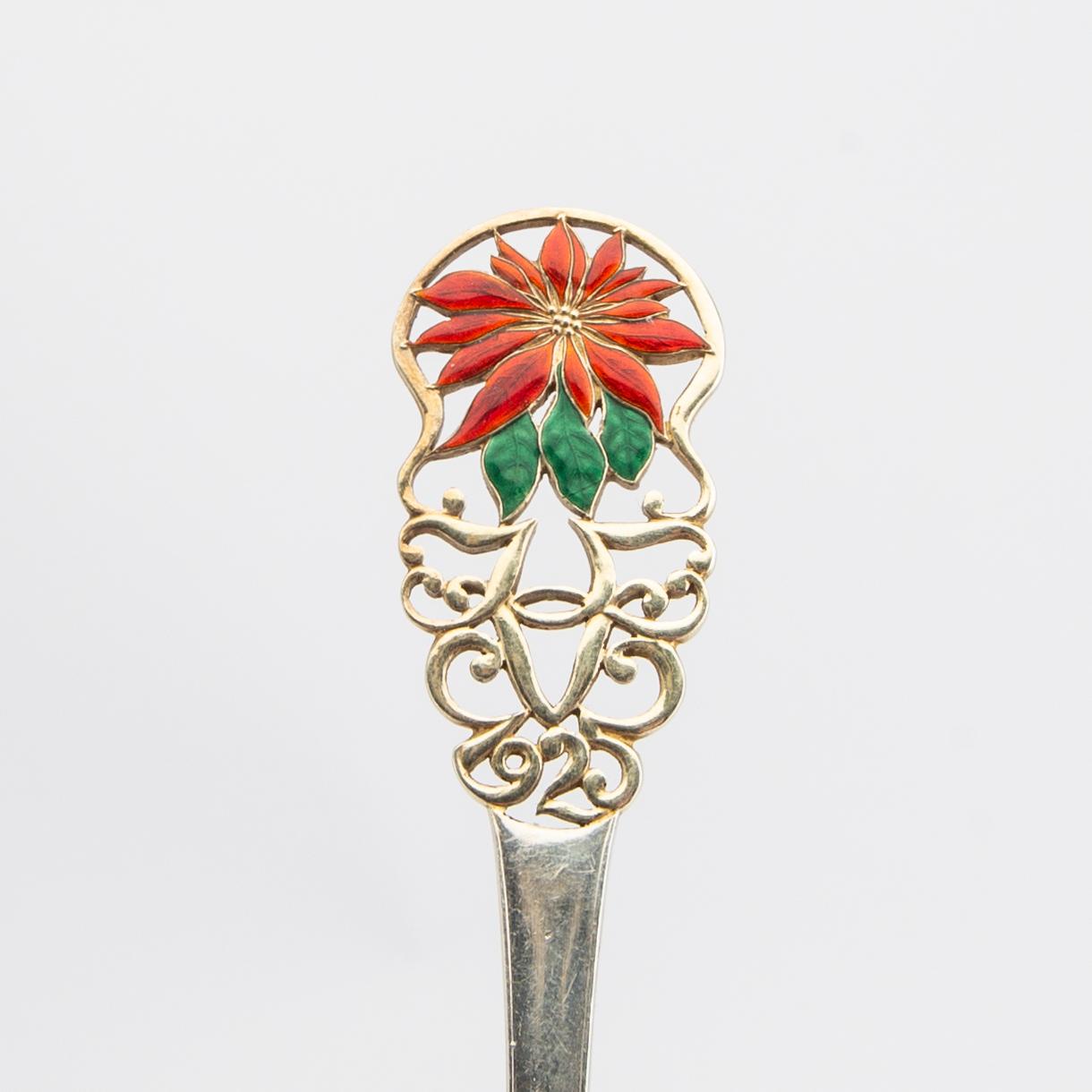 Anton Michelsen, Christmas cutlery, 21 pieces, gilded sterling silver and enamel, Denmark total weight 888 grams.