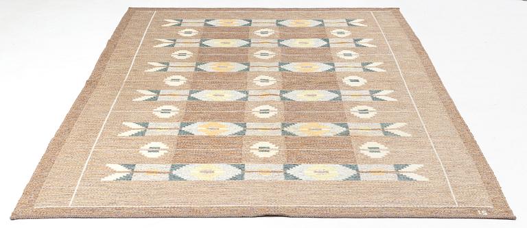 Ingegerd Silow, a flat weave carpet, signed IS, ca 307 x 190 cm.