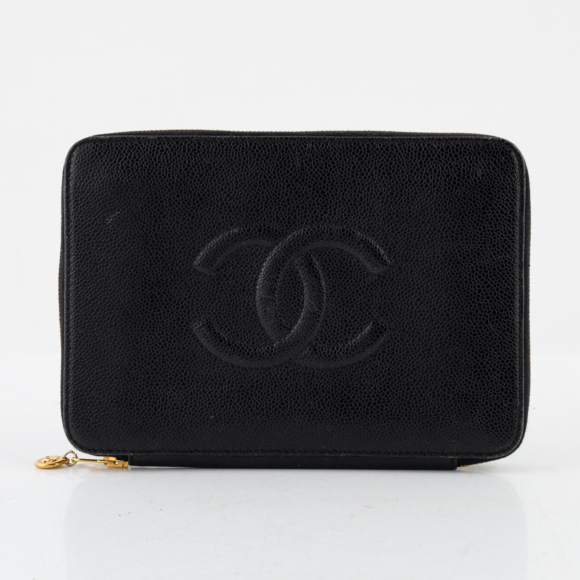 Chanel, A black caviar leather clutch, 1997 - 1999.