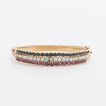 BANGLE 14K gold w rubies, sapphires and opal.