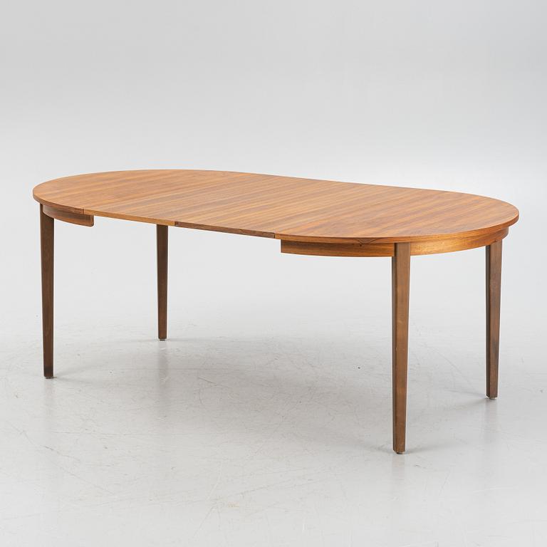 A walnut veneer dining table, 1950-60s.