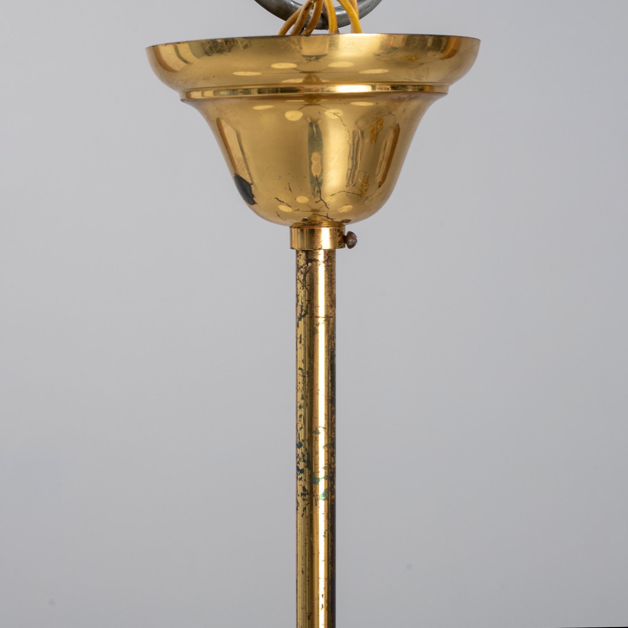 A 1950's glass and brass ceiling light.