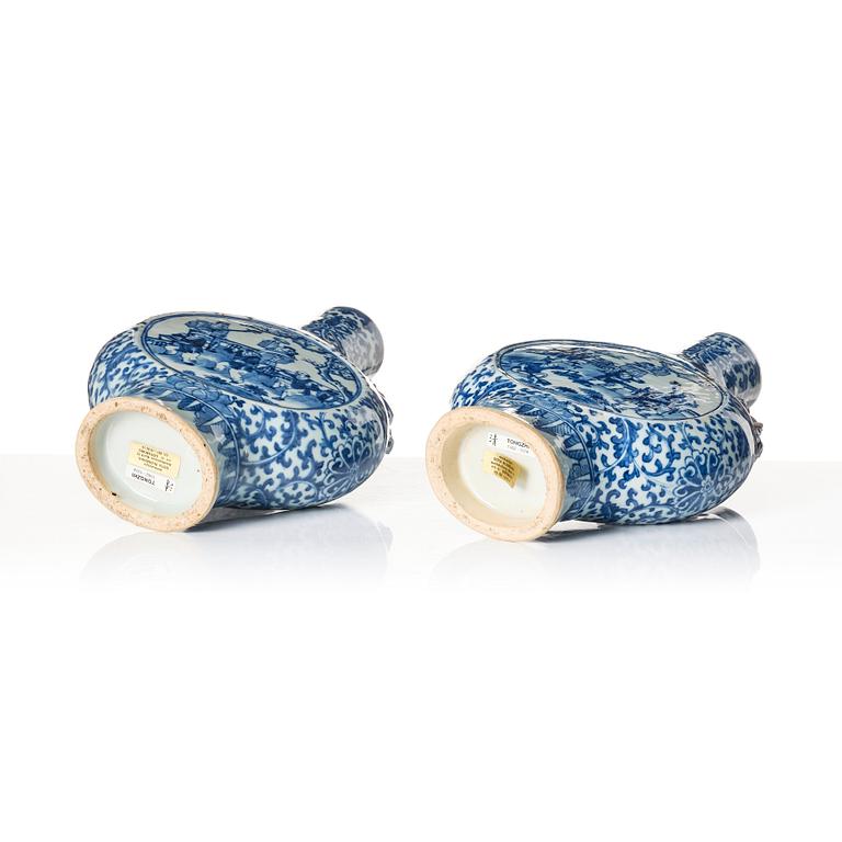 A pair of blue and white moon flasks, Qing dynasty, 19th Century.