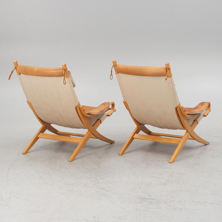 A pair of armchairs, Nielaus Møbler, Denmark, second half of the 20th Century.