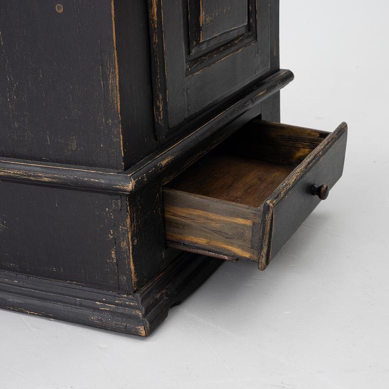 A Baroque wall cabinet, 18th Century.