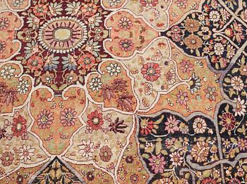 An antique Kerman Laver carpet, c. 586 x 385 cm.