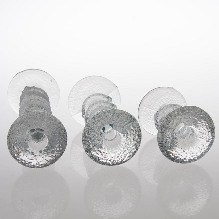 TIMO SARPANEVA, SEVEN FESTIVO GLASS CANDLESTICKS, Iittala, partly signed TS.