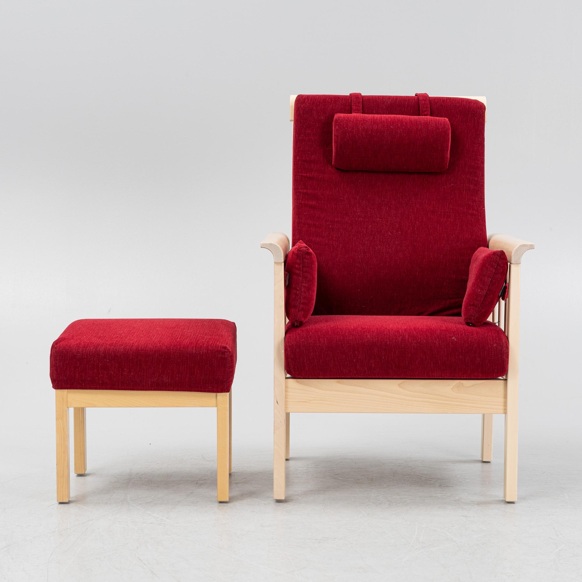 A "Sundborn" easy chair with stool, from Albin I Hyssna.
