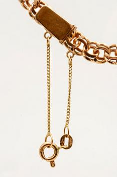 An 18K gold chain. 38g.
