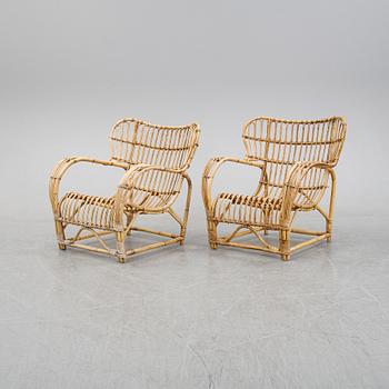 A pair of rattan easy chairs, second half of the 20th Century.