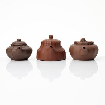 A group of three yixing teapots, China, 1980s.