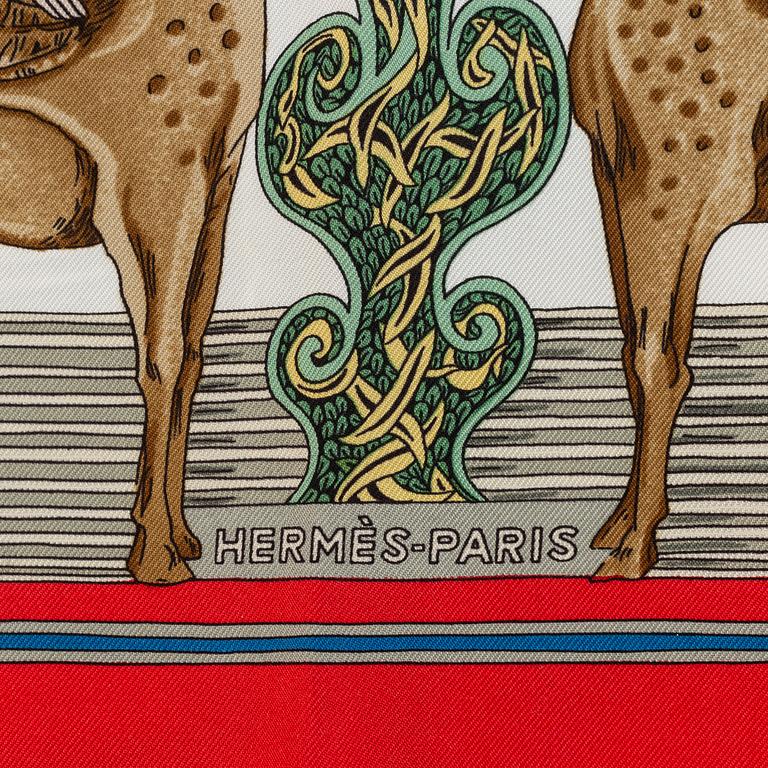 Hermès, an 'Au Fil de la Soie' silk scarf.