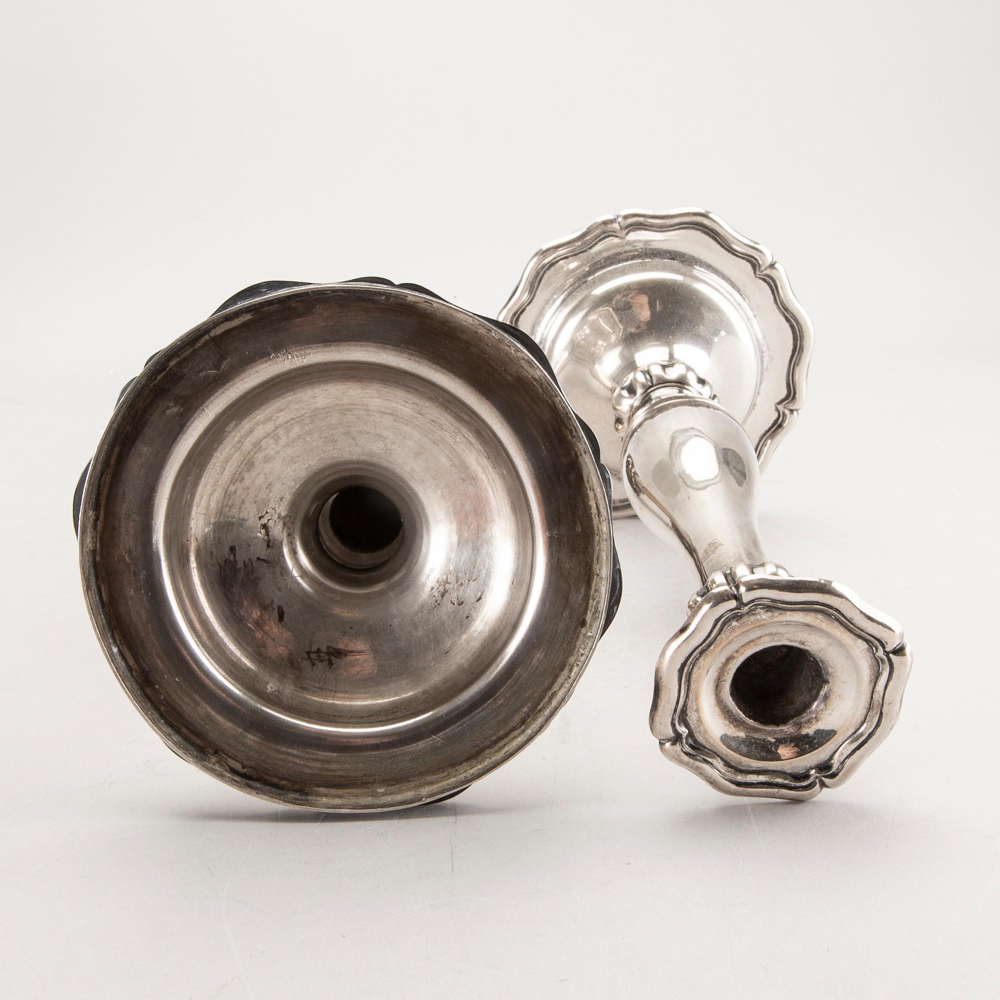 A pair of Austrian silver candle sticks Vienna 1852 weight 626 gr.