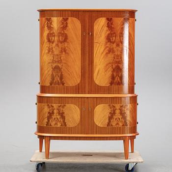 A mahogany veneered cabinet, mid 20th Century.