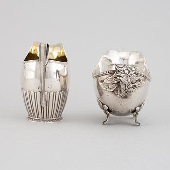 Two creamers, silver, one german and one Johan Petter Grönvall, Stockholm 1827.