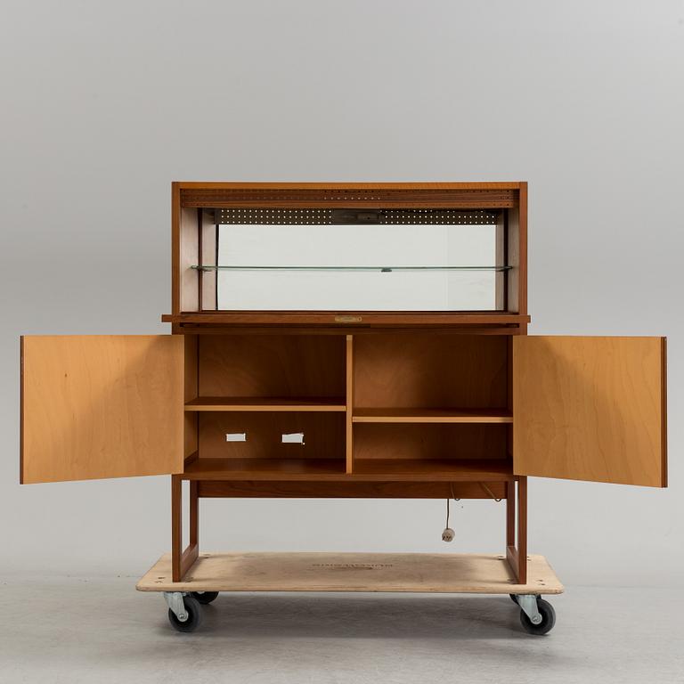 A second half of the 20th century teak veneered bar cabinet by Arne Wahl-Iversen, IKEA.