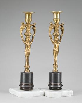 LJUSSTAKAR, ett par, empirestil, omkring 1900.