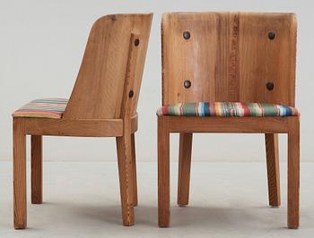 A pair of Axel Einar Hjorth 'Lovö' stained pine armchairs, Nordiska Kompaniet, 1930's.
