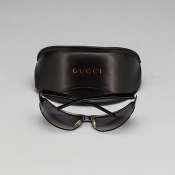 SOLGLASÖGON, Gucci.