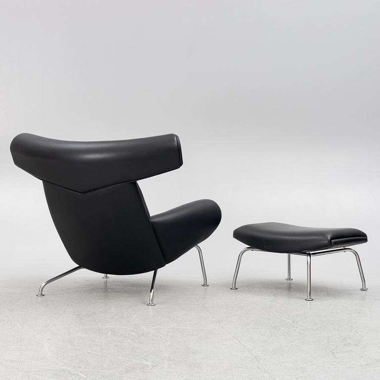 Hans J. Wegner, fåtölj med fotpall, "Ox Chair", EJ-100, Erik Jørgensen Møbelfabrik A/S, Svendborg, Danmark.