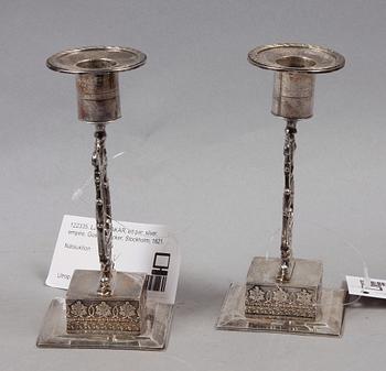 LJUSSTAKAR, ett par, silver, empire, Gustaf Folcker, Stockholm, 1821.