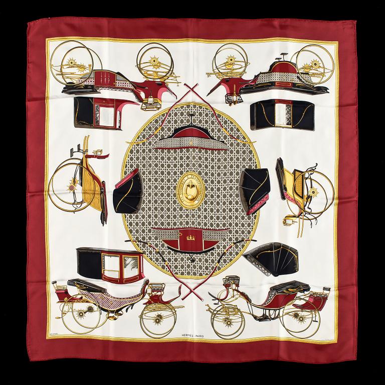 A silk scarf by Hermès, "Les Voitures a Transformation".