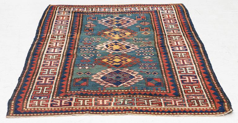 An antique Kazak rug, southern Caucasus, c 146 x 100 cm.