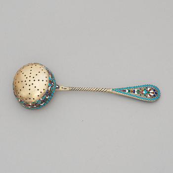 A Russian early 20th century silver-gilt and enamel cane-spoon, unidentified makers mark Moscow 1899-1908.