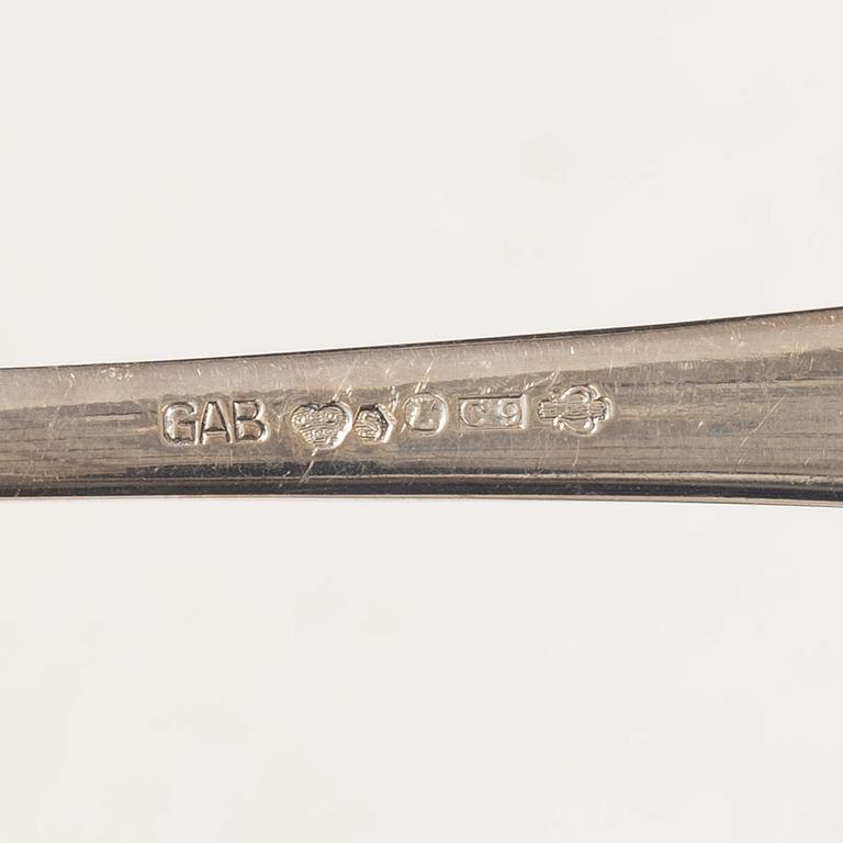 Guldsmedsaktiebolaget (GAB), A 24 piece 'Chippendale' silver cultery service, Stockholm 1950's.