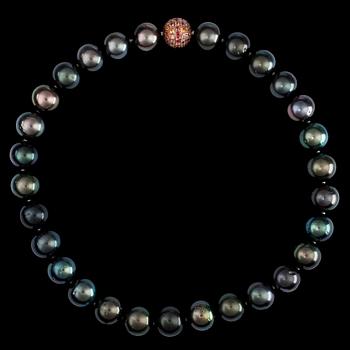 1301. A cultured Tahiti pearl necklace, 15-13.4 mm, clasp set with orange-red sapphires.