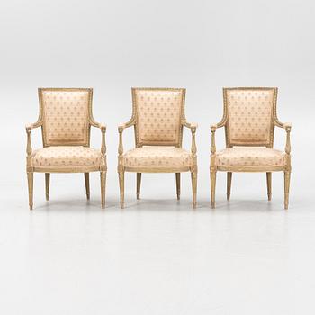 Three Louis XVI armchairs, France, late 18th century.