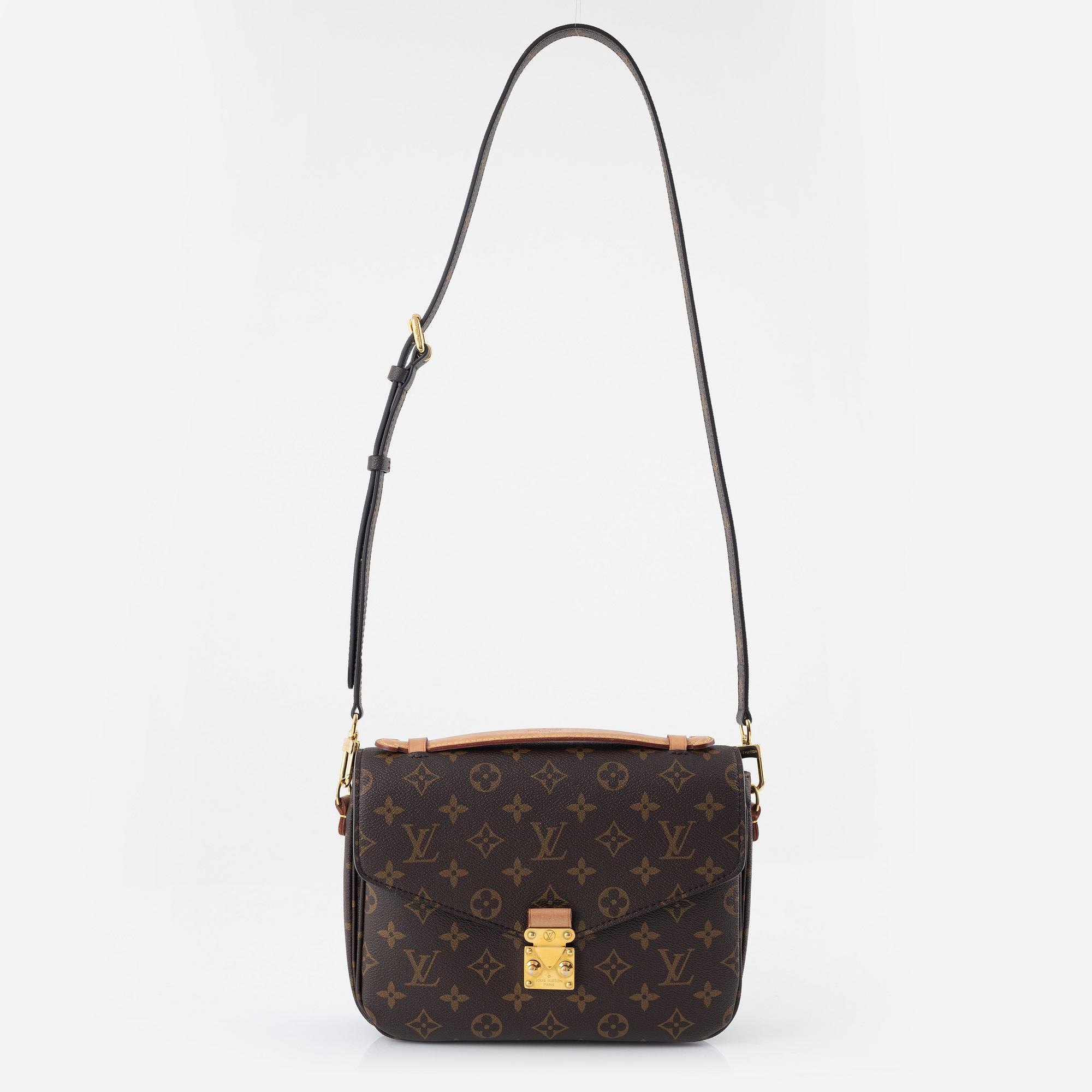Louis Vuitton a Pochette Metis handbag with extra shoulder strap 2020. Bukowskis