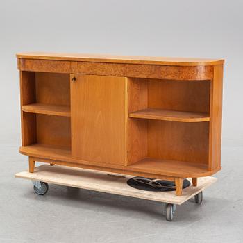 A Swedish Modern elmwood veneered bookcase, 1930's/40's.